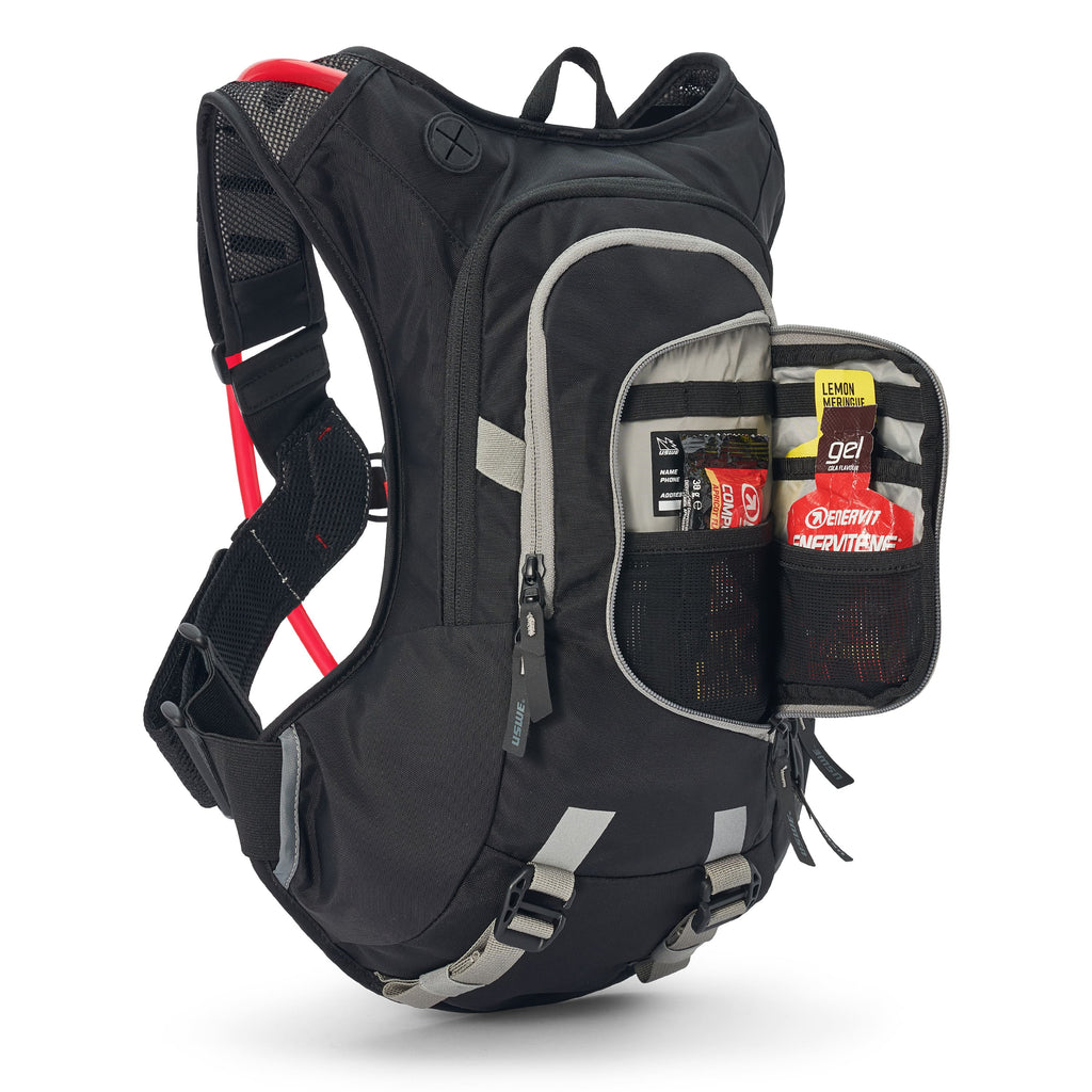 Sac d’hydratation USWE Moto Hydro 12L noir pour enduro hard enduro rallye raid et adventure petit poche ouverte
