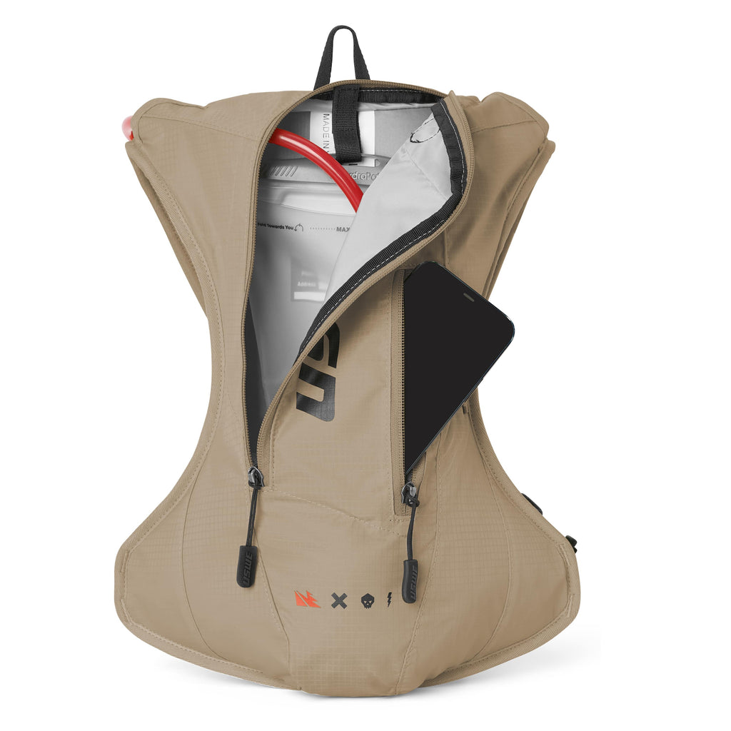 Sac d’hydratation USWE OUTLANDER 4L Moto couleur sable pour enduro hard enduro rallye et motocross poche ouverte