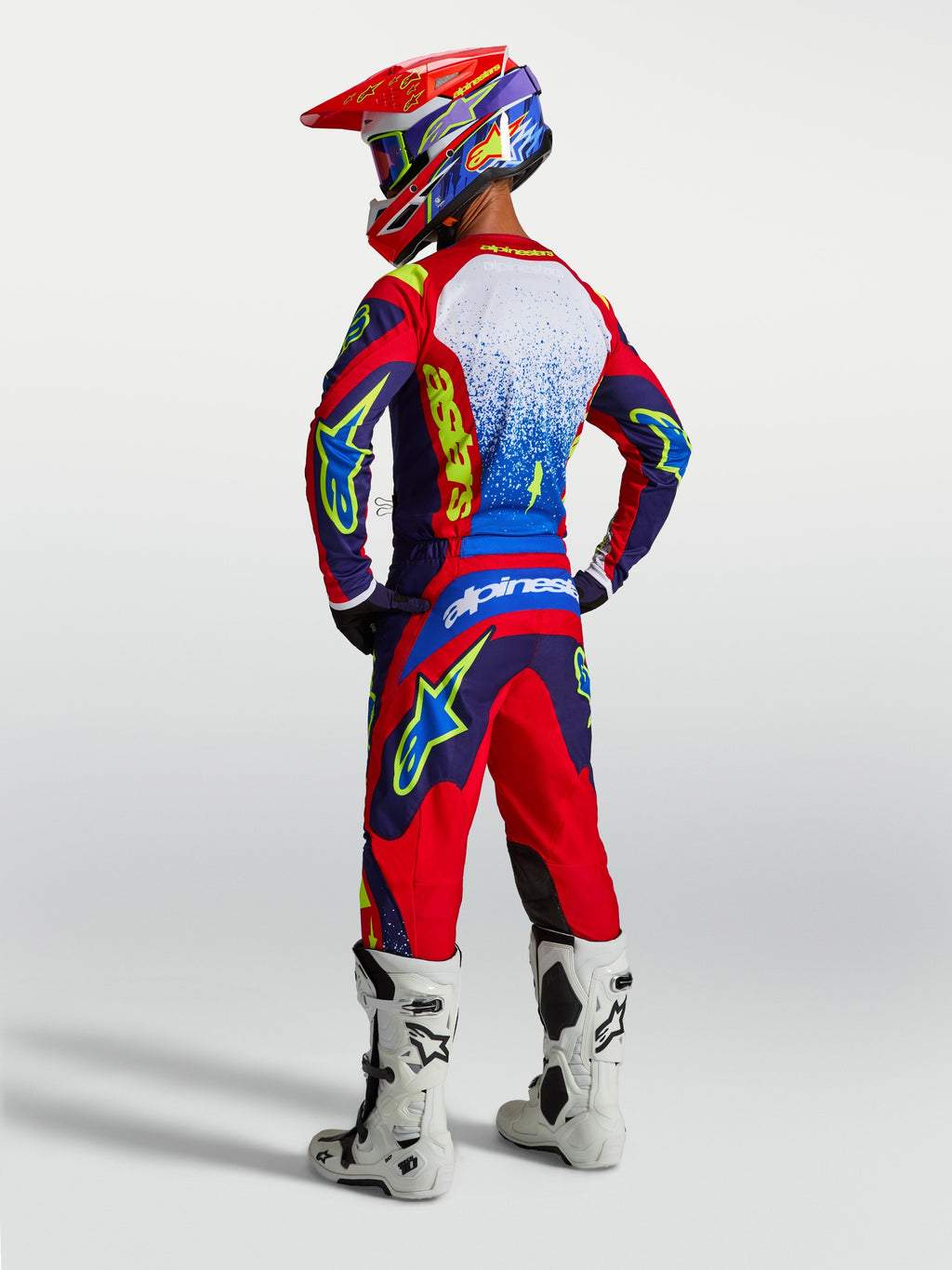 Tenue cross Alpinestars Fluid Drag bleu marine et rouge vue de dos