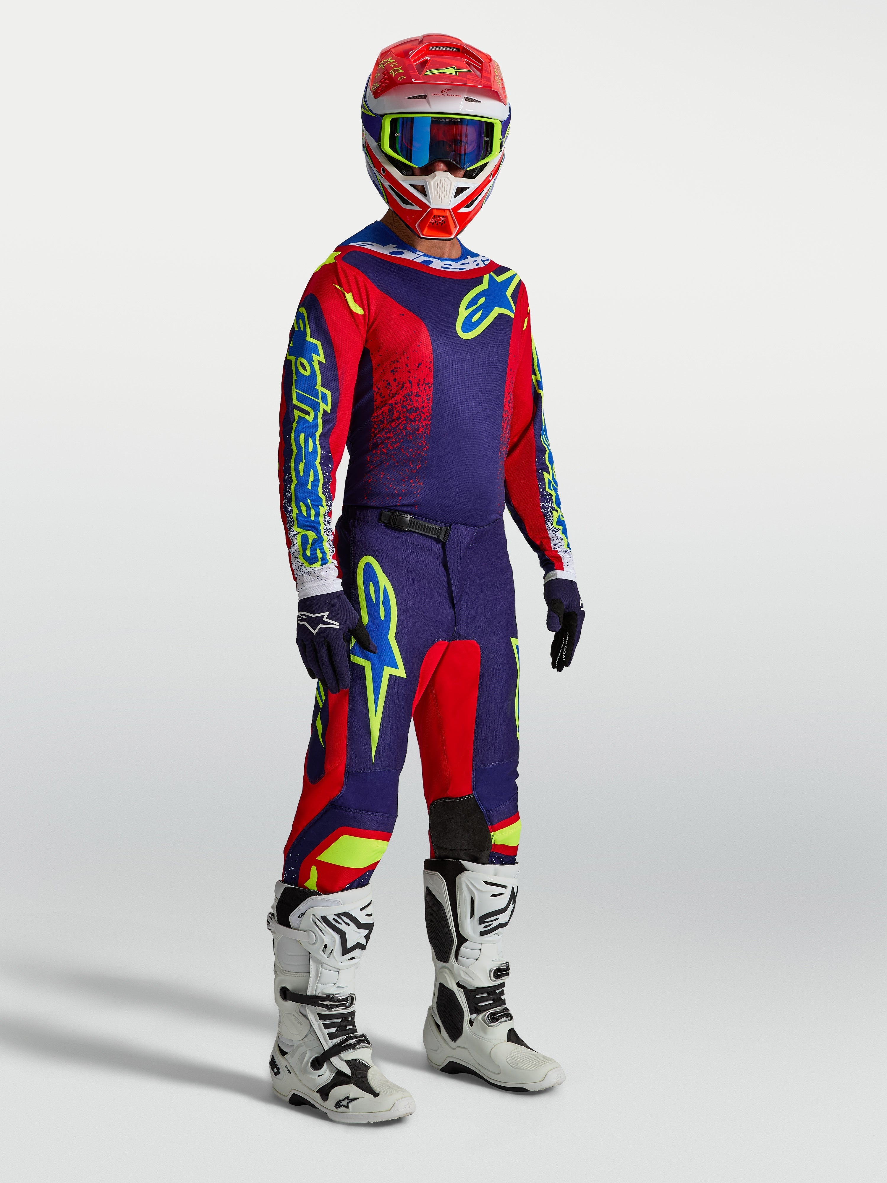 Tenue cross Alpinestars Fluid Drag bleu marine et rouge vue de face