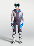 Tenue cross complète Alpinestars Fluid Drag gris et bleu maillot et pantalon vue d'ensemble