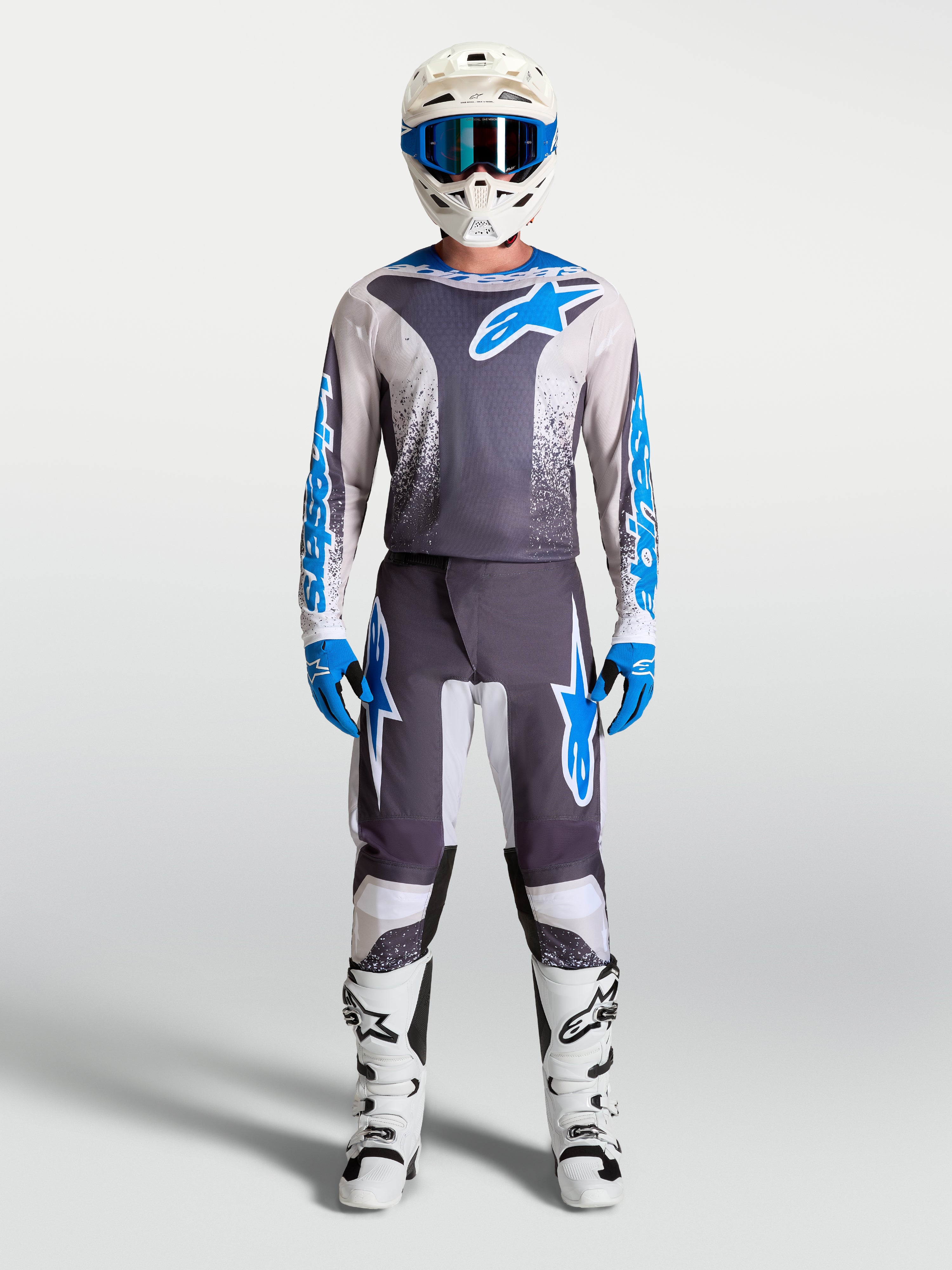 Tenue cross complète Alpinestars Fluid Drag gris et bleu maillot et pantalon vue d'ensemble