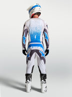 Tenue cross Alpinestars Fluid Drag gris bleu vue de profil