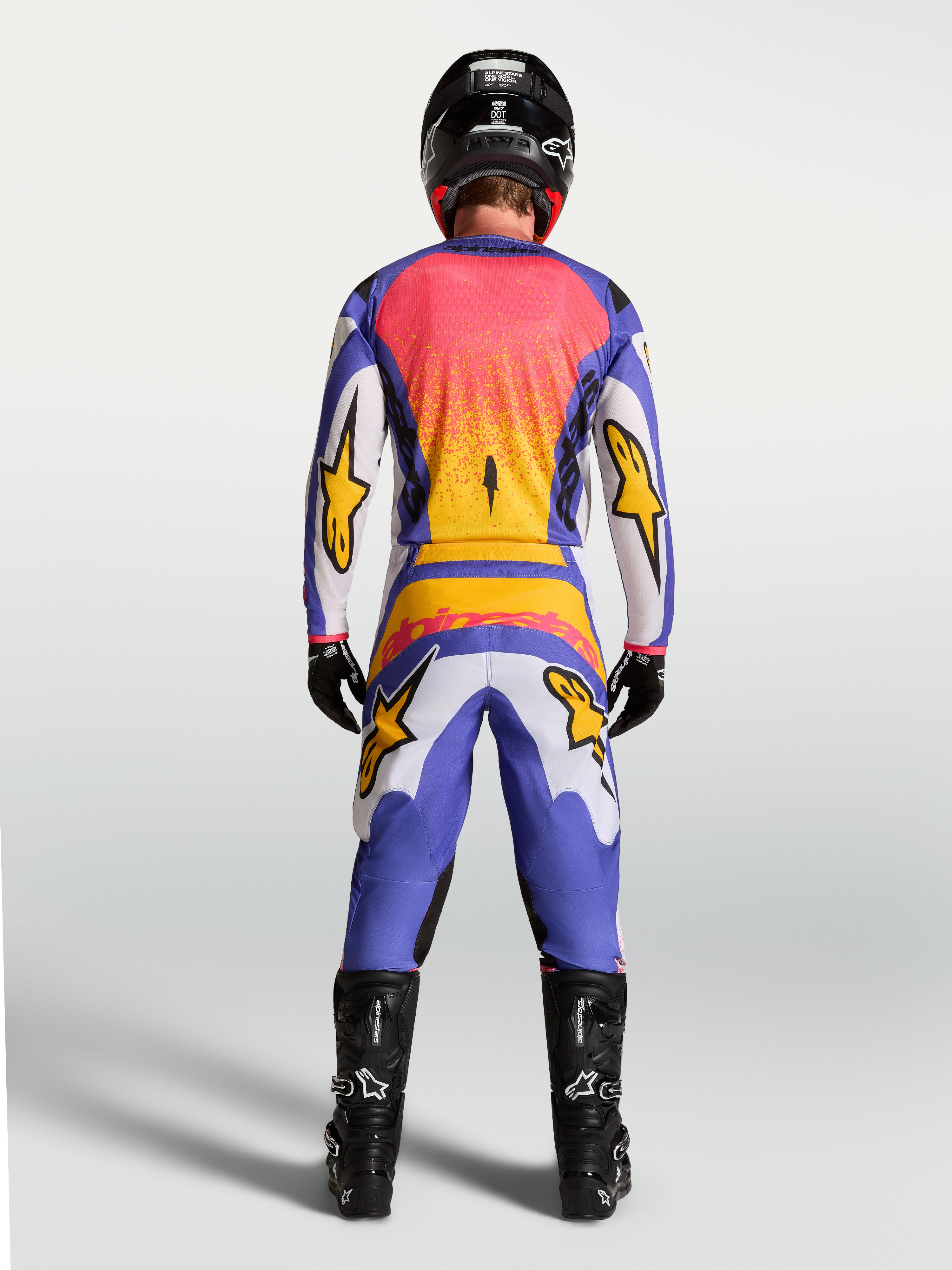 Tenue cross Alpinestars Fluid Drag lilas et bleu iris vue de profil