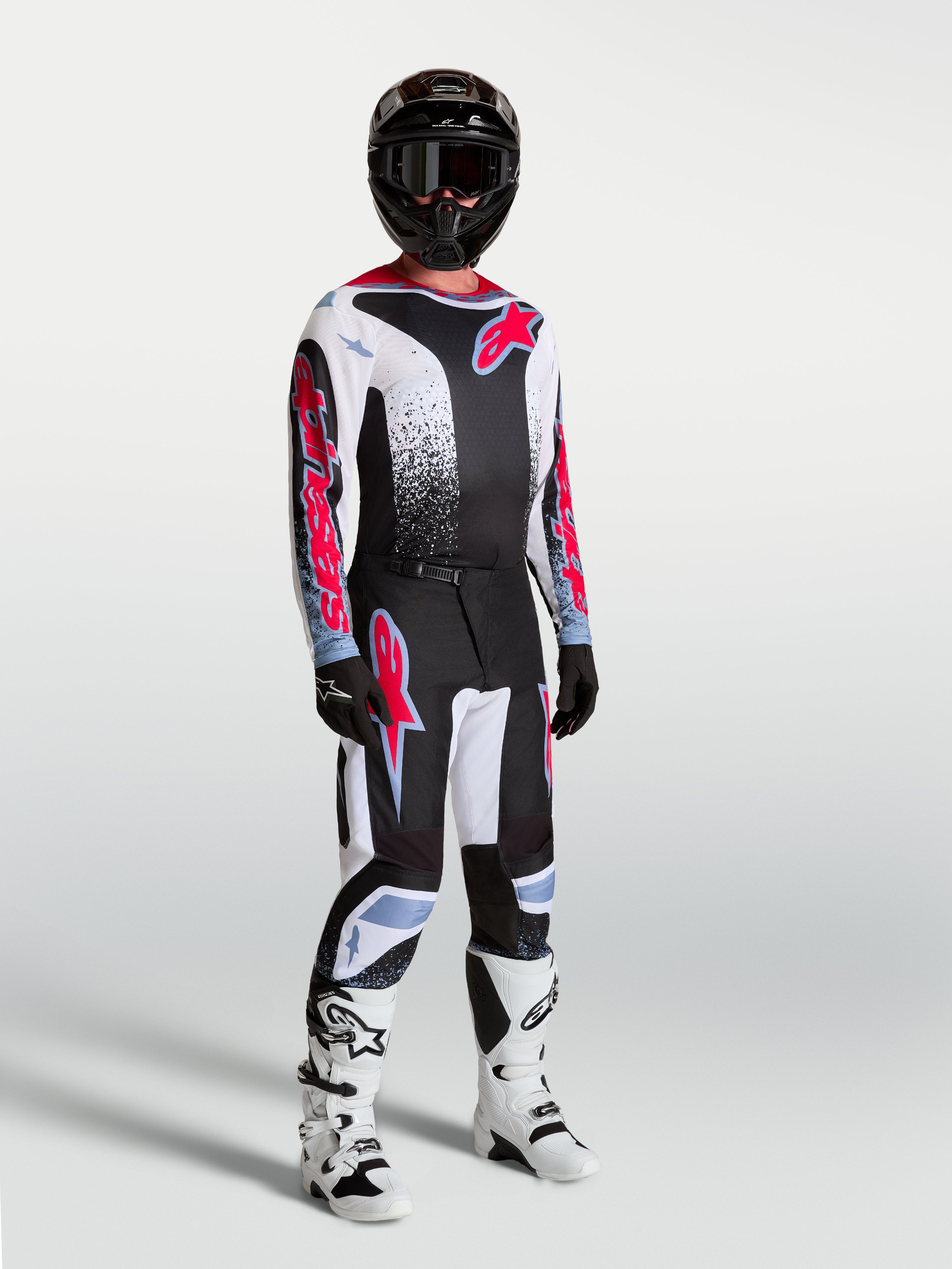 Tenue cross Alpinestars Fluid Drag noir blanc rouge vue de face