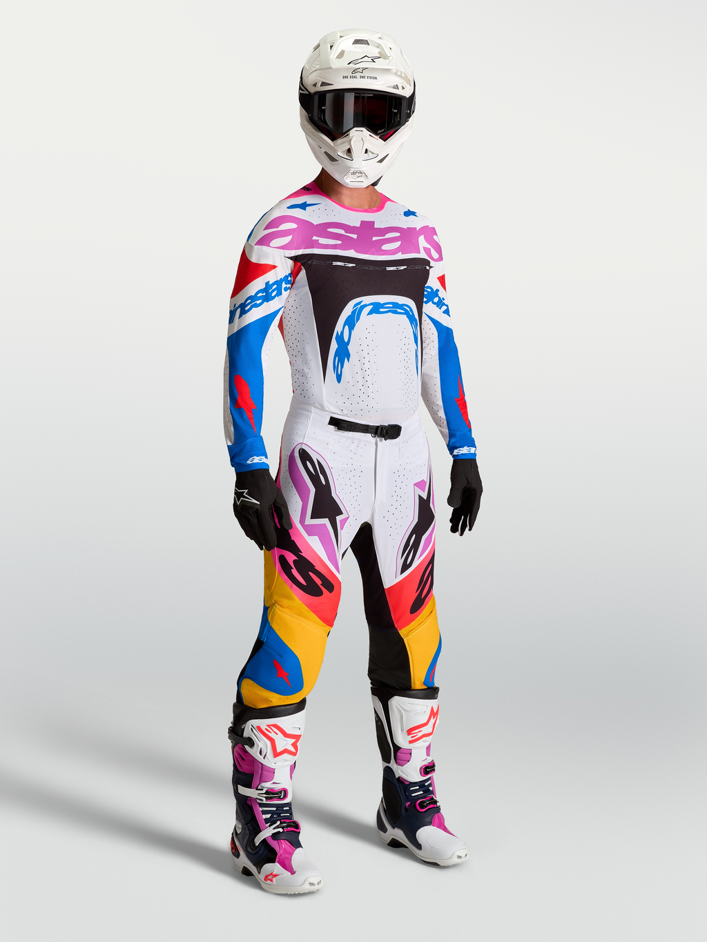 Tenue cross Alpinestars Supertech Dyna blanc bleu accents roses vue de face