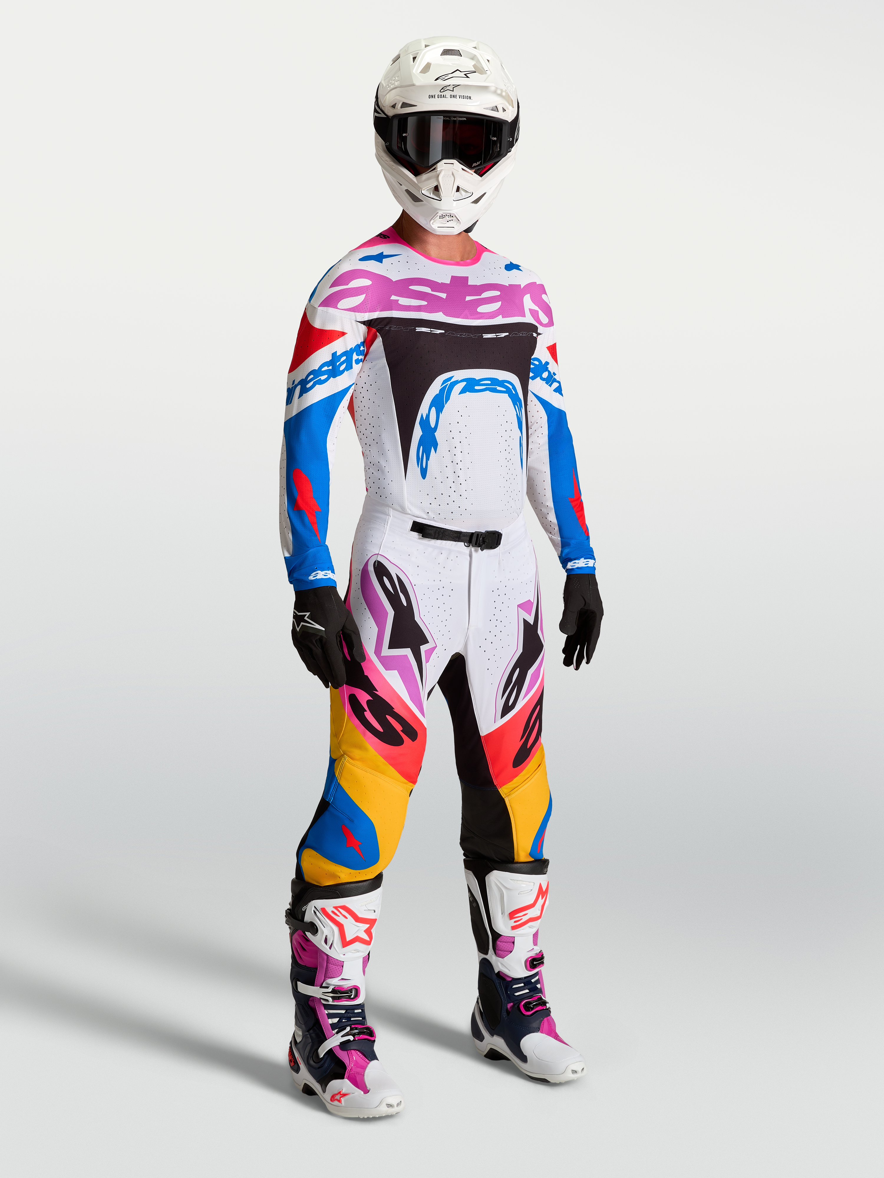 Tenue cross Alpinestars Supertech Dyna blanc bleu accents roses vue de face