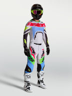 Tenue cross Alpinestars Supertech Dyna lilas et vert fluo vue de face