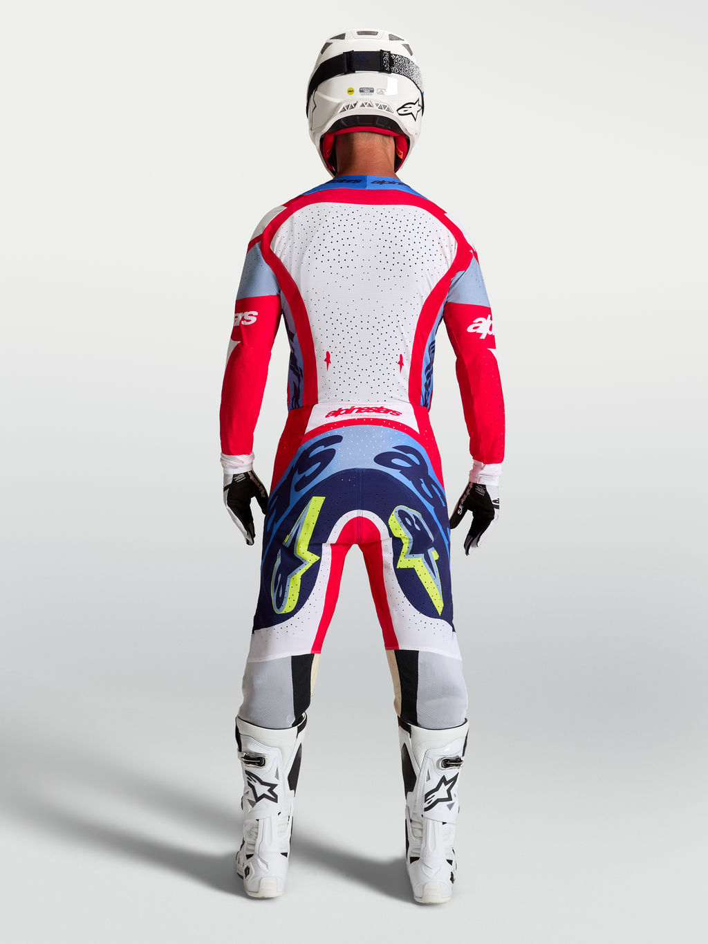 Tenue cross Alpinestars Supertech Dyna rouge et blanc vue de dos