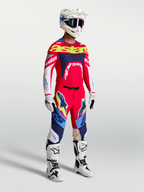 Tenue cross Alpinestars Supertech Dyna rouge feu bleu marine vue de face