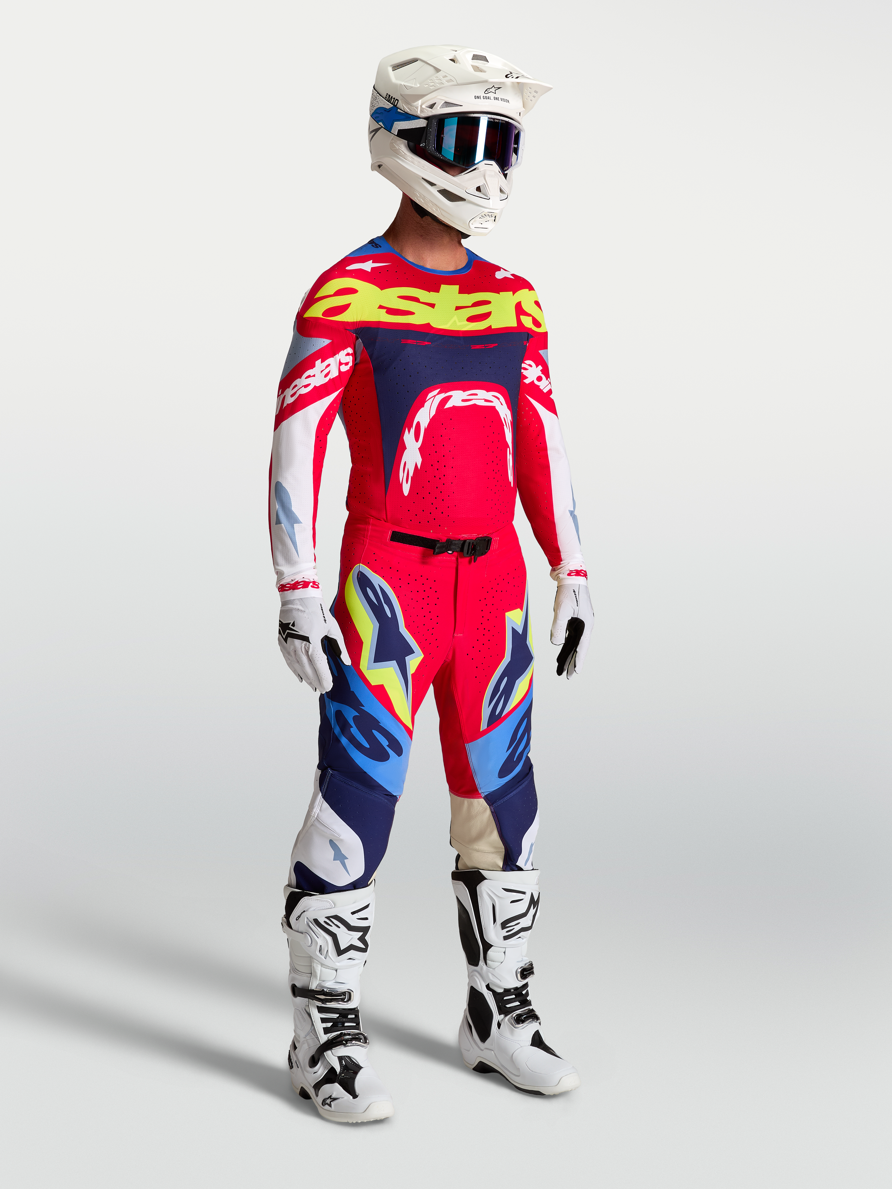 Tenue cross Alpinestars Supertech Dyna rouge feu bleu marine vue de face