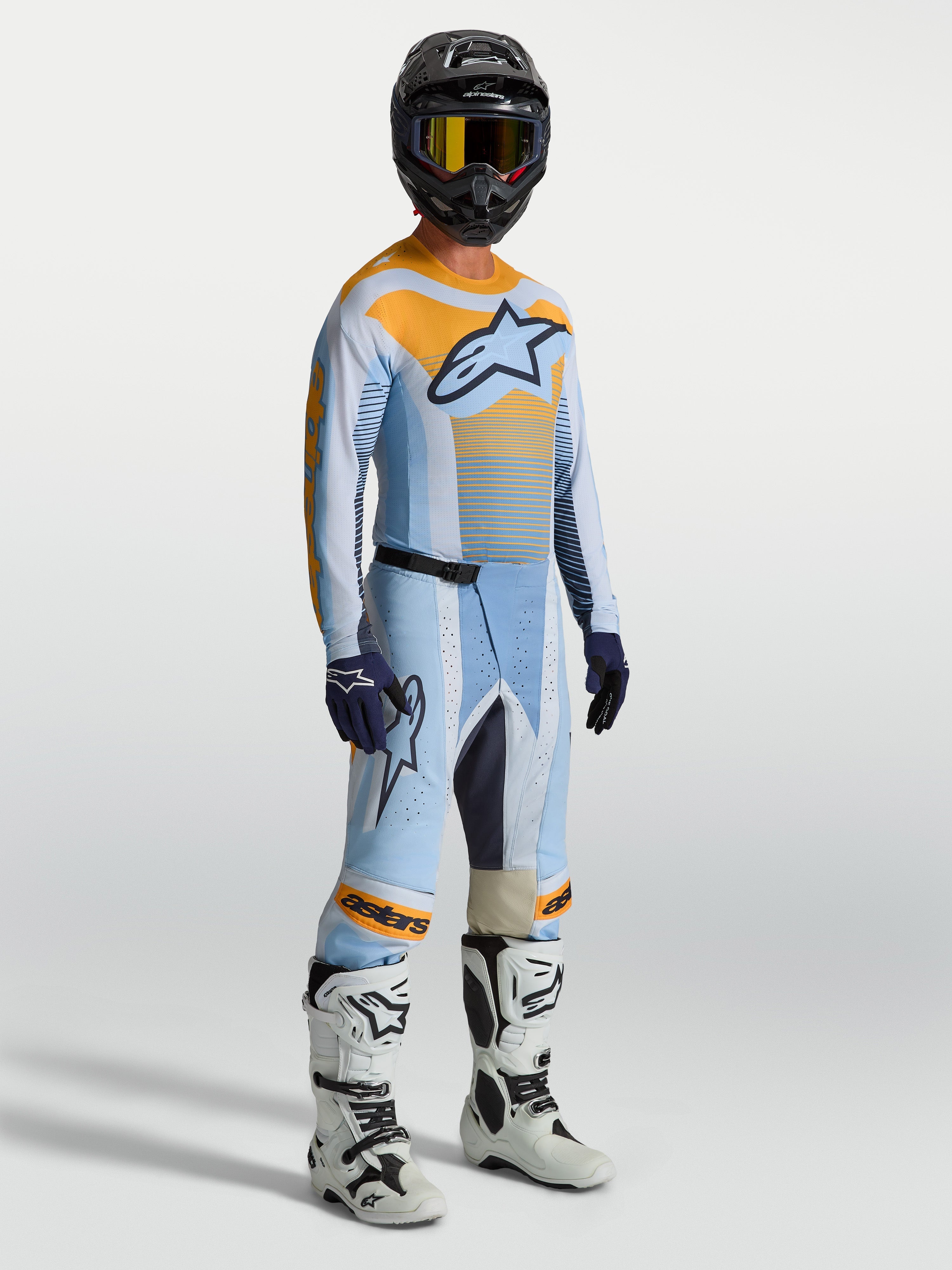 Tenue cross Alpinestars Techstar Maven bleu orange vue de face