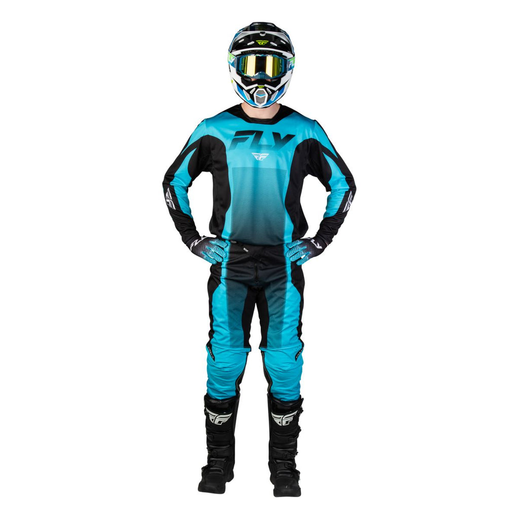 Tenue cross Fly Racing Kinetic Fade 2027 Bleu Noir Blanc portée - maillot et pantalon