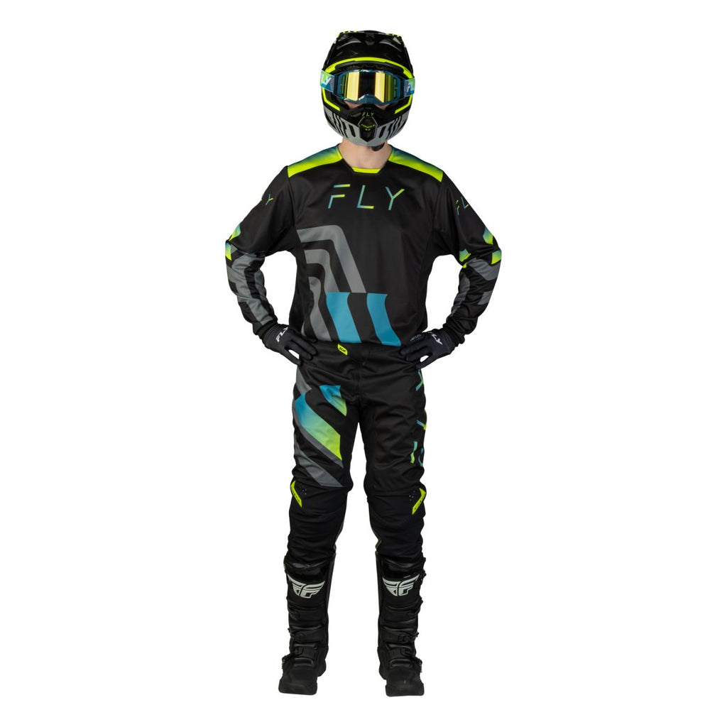Tenue cross Fly Racing Kinetic Volt 2027 Noir Gris Turquoise Jaune portée - maillot et pantalon
